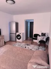 Garsoniera 27 mp, baie si chicineta proprie, complet mobilat 