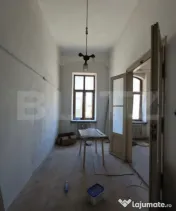 Apartament cu 2 camere, tavan înalt și potențial excelent 