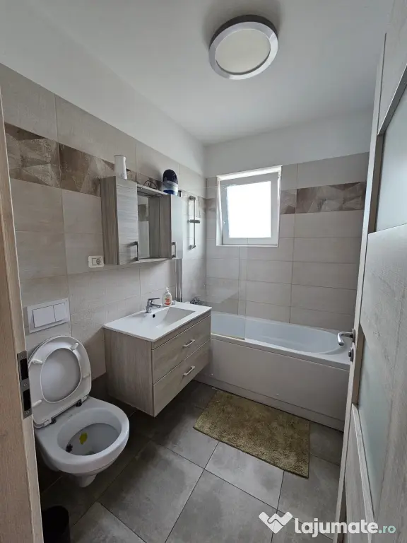 Apartament 2 camere + grădină 50 m + parcare