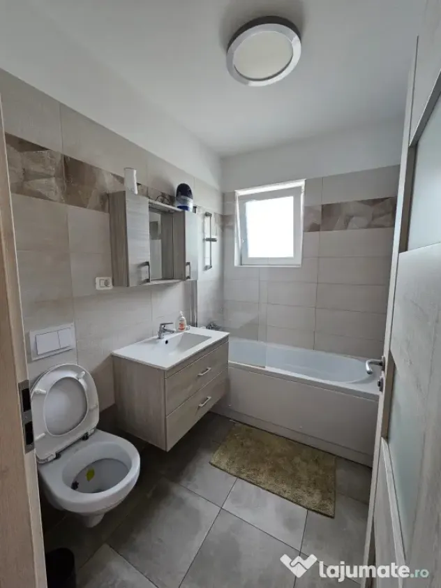 Apartament 2 camere + grădină 50 m + parcare