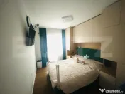 Apartament semidecomandat cu 3 camere,2 bai, parcare inclusa 