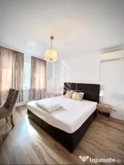 Cladire cu 4 apartamente si sala de evenimente ptr 60 persoane 
