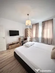 Cladire cu 4 apartamente si sala de evenimente ptr 60 persoane 