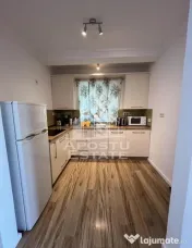 Cladire cu 4 apartamente si sala de evenimente ptr 60 persoane 