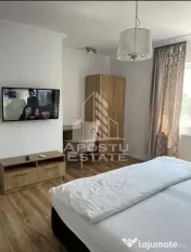 Cladire cu 4 apartamente si sala de evenimente ptr 60 persoane 