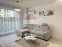 Inchiriere Apartament cu 2 camere, grădină de 62 mp și parcare 
