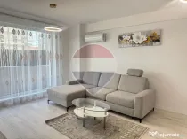 Inchiriere Apartament cu 2 camere, grădină de 62 mp și parcare