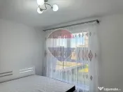 Inchiriere Apartament cu 2 camere, grădină de 62 mp și parcare 