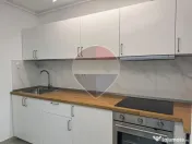 Inchiriere Apartament cu 2 camere, grădină de 62 mp și parcare 