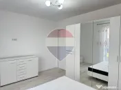 Inchiriere Apartament cu 2 camere, grădină de 62 mp și parcare 