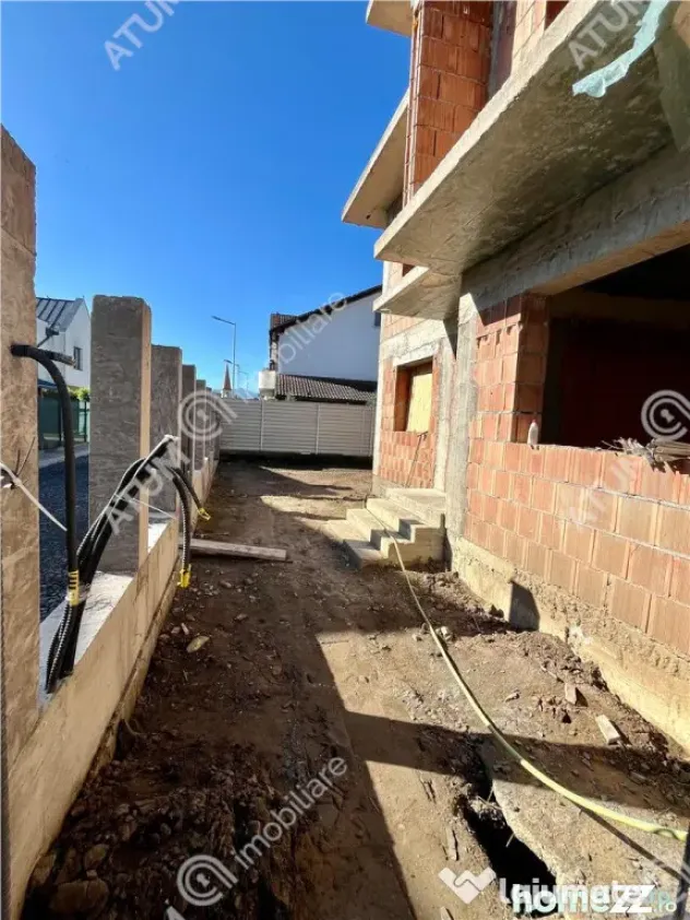 Casa cu 4 camere 2 bai si teren de 230 mp Selimbar