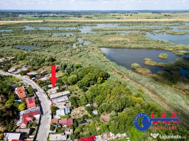 ID 7854 EXCLUSIVITATE – Teren cu casă și ieșire la canal