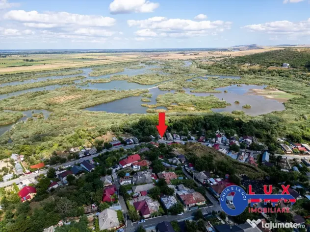 ID 7854 EXCLUSIVITATE – Teren cu casă și ieșire la canal