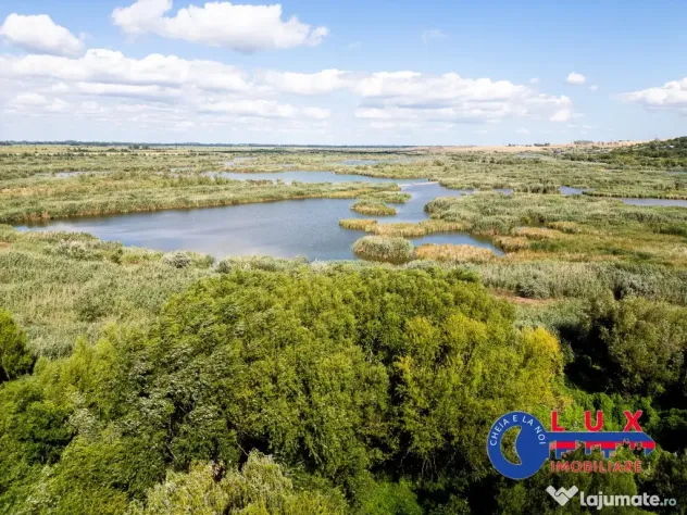 ID 7854 EXCLUSIVITATE – Teren cu casă și ieșire la canal