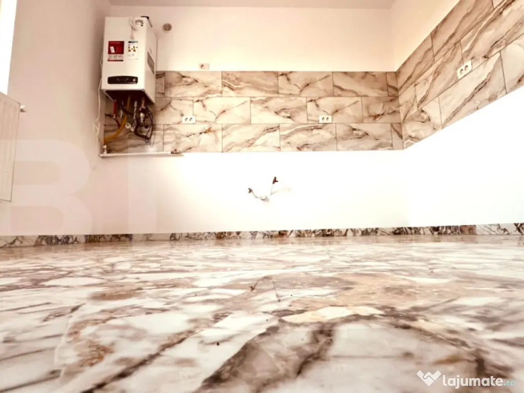 Casa plan parter de vanzare, cu 4 camere, 110 mp utili, zona