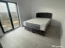 Apartament 2 camere cu curte proprie și 2 locuri de parcare