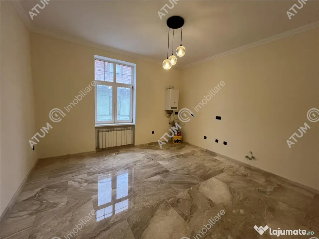 Spatiu de birouri complet renovat cu 3 camere si 2 bai zona