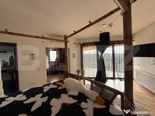 Casa P+1+M cu piscina si 1057 mp de teren, pozitionata inedi