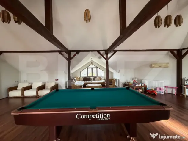 Casa P+1+M cu piscina si 1057 mp de teren, pozitionata inedi