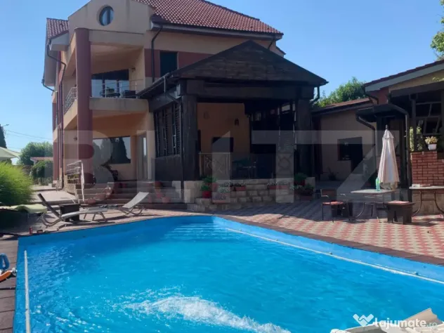 Casa P+1+M cu piscina si 1057 mp de teren, pozitionata inedi