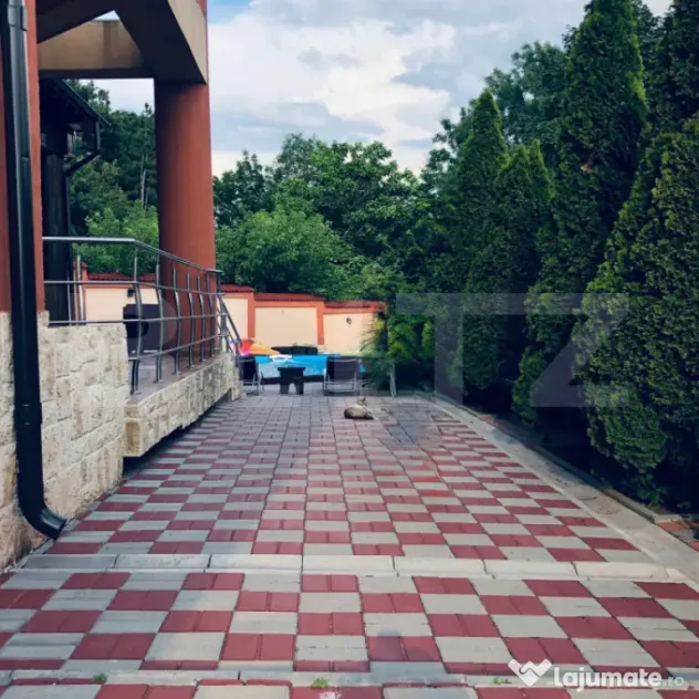 Casa P+1+M cu piscina si 1057 mp de teren, pozitionata inedi