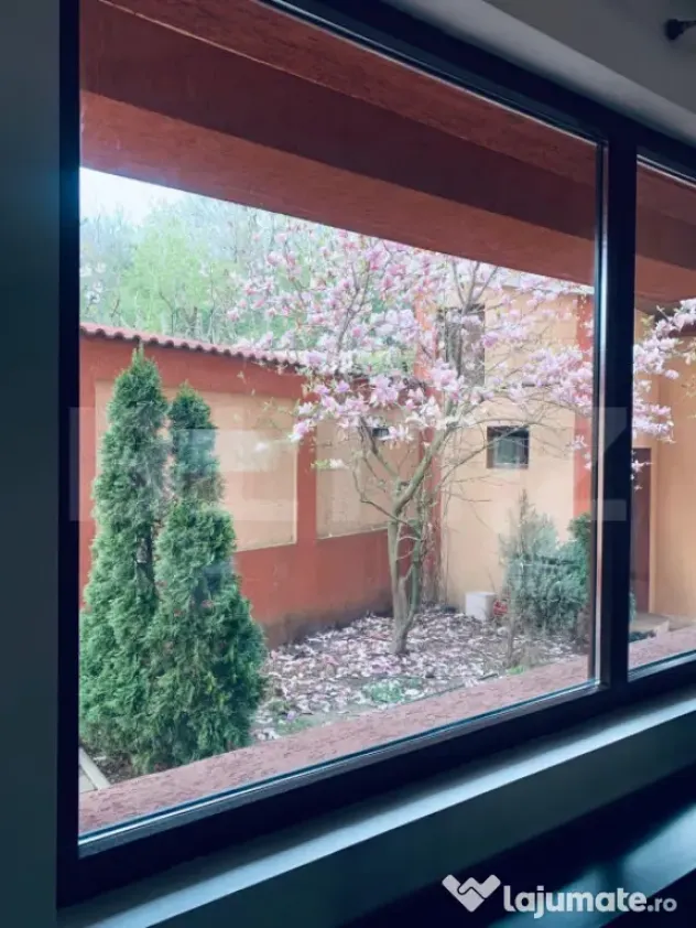 Casa P+1+M cu piscina si 1057 mp de teren, pozitionata inedi