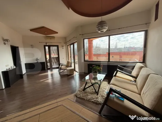 Casa P+1+M cu piscina si 1057 mp de teren, pozitionata inedi