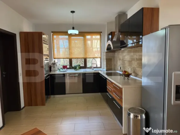 Casa P+1+M cu piscina si 1057 mp de teren, pozitionata inedi