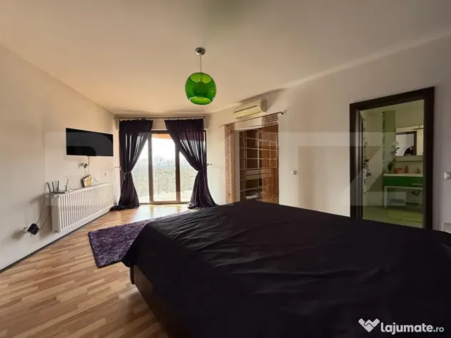 Casa P+1+M cu piscina si 1057 mp de teren, pozitionata inedi