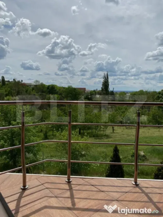Casa P+1+M cu piscina si 1057 mp de teren, pozitionata inedi
