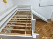 Pat cu tobogan pentru copii