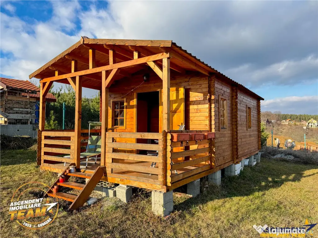 Teren intravilan 520 mp cu casuta din lemn,zona linistita,ap