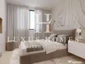 Apartament la parter, cu grădină și piscină, situat într-o zonă premium