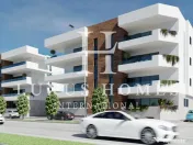 Apartament la parter, cu grădină și piscină, situat într-o zonă premium