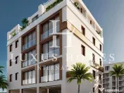 Apartament cu acces la plajă și piscină situată într-o zonă de coastă vibrantă 