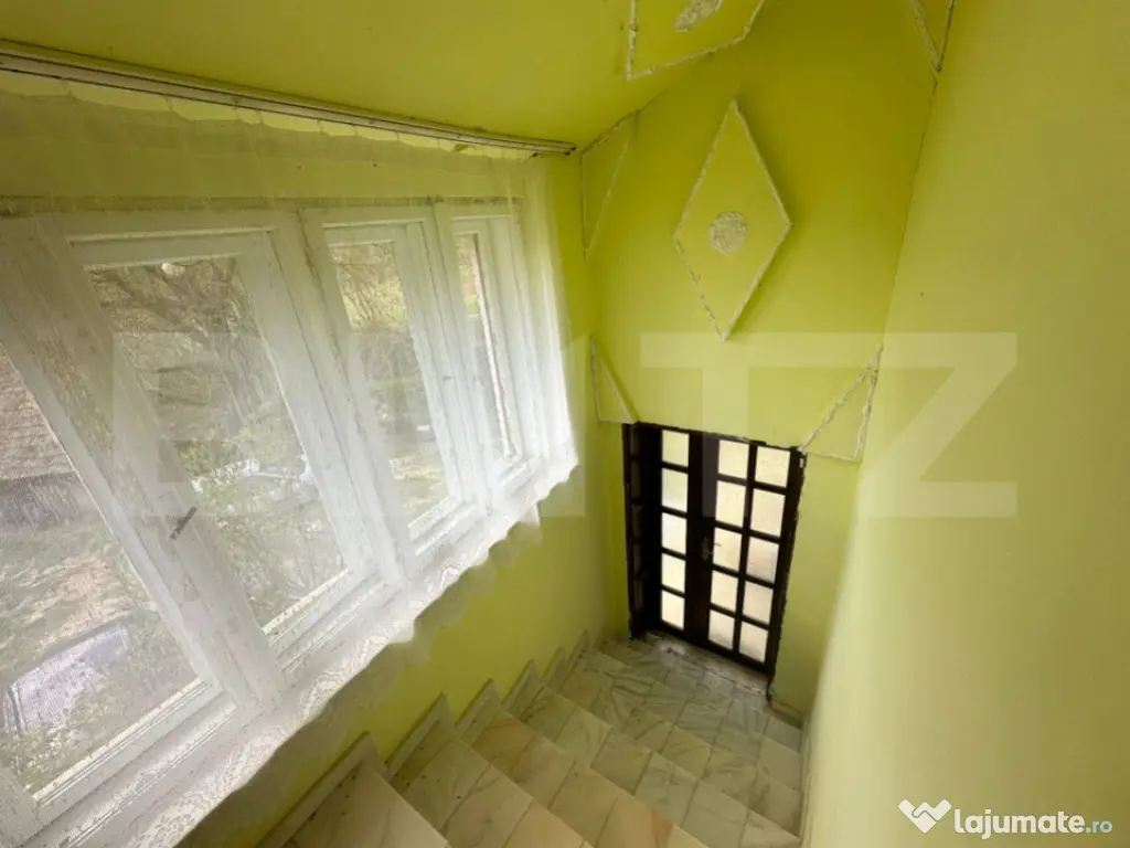 Casă cu 1.2 ha teren, liniște totală, livadă, acces asfa