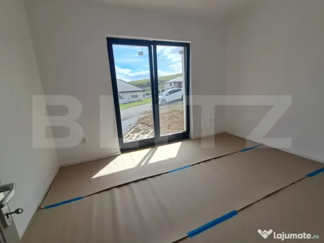 Locuință modernă în Livezeni, compartimentare eficientă