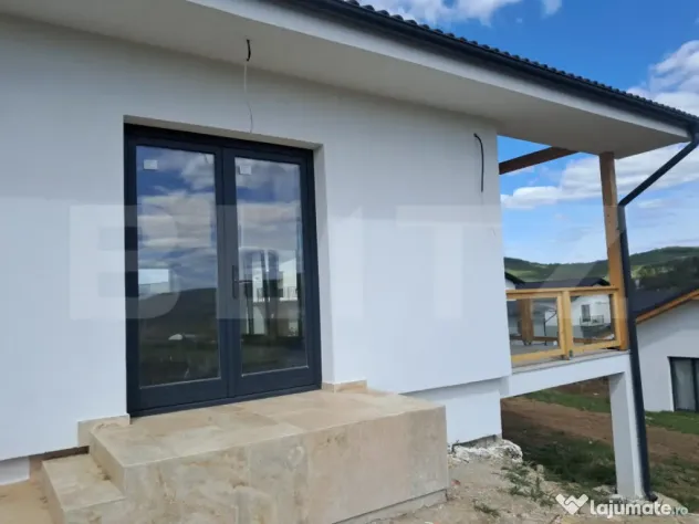 Locuință modernă în Livezeni, compartimentare eficientă
