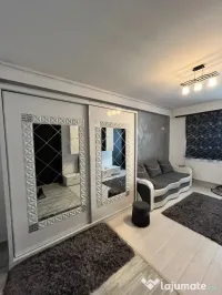 închiriere studio 2 camere +bucătărie.Utilat și mobilat modern 
