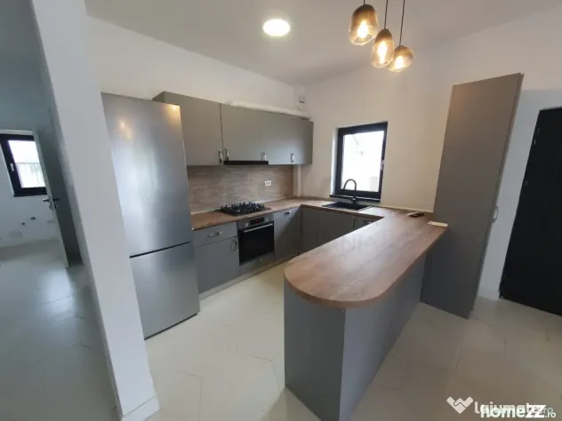 Casa cu 4 camere tip duplex Tunari