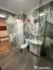 Apartament cu parcare securizata- DE INCHIRIAT 