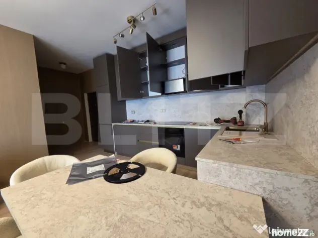 Apartament modern, finisaje premium, garaj, zona Eroilor - Floresti (Cluj)