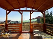 Casuta din lemn,cu 520mp teren intravilan,zona linistita,apr