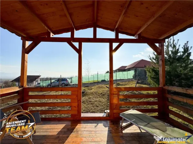 Casuta din lemn,cu 520mp teren intravilan,zona linistita,apr
