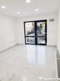 Apartament 3 camere, parter înalt, finisat