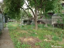 Teren de vanzare cu casa de 160 mp utili si 590 mp curte,