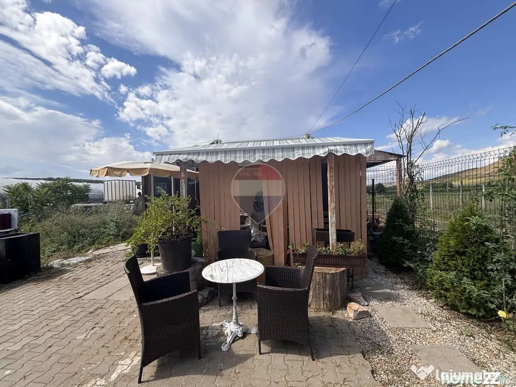 Teren 9,500 mp cu sere si utilitati langa DN 14 - Sura Mare (Sibiu)