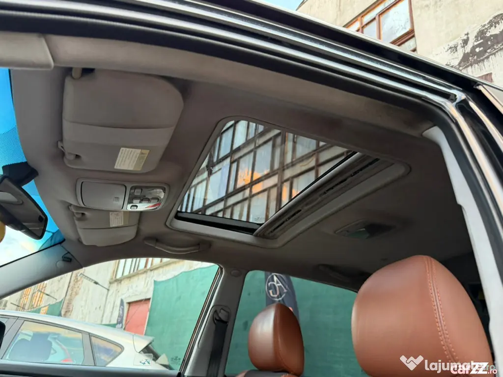Kia Sportage 2.0 CRDi 140CP 4x4 / Trapă / Navi / Climatronic