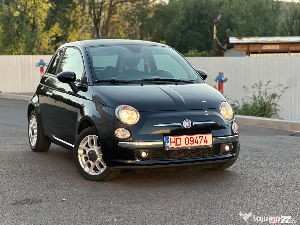 Fiat 500*km:152.125*clima*2 randuri de roti*1.3 benzina*69 cp!