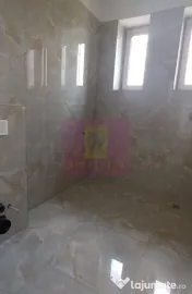 Gulia, casă nouă parter 4 camere, curte 514 mp 